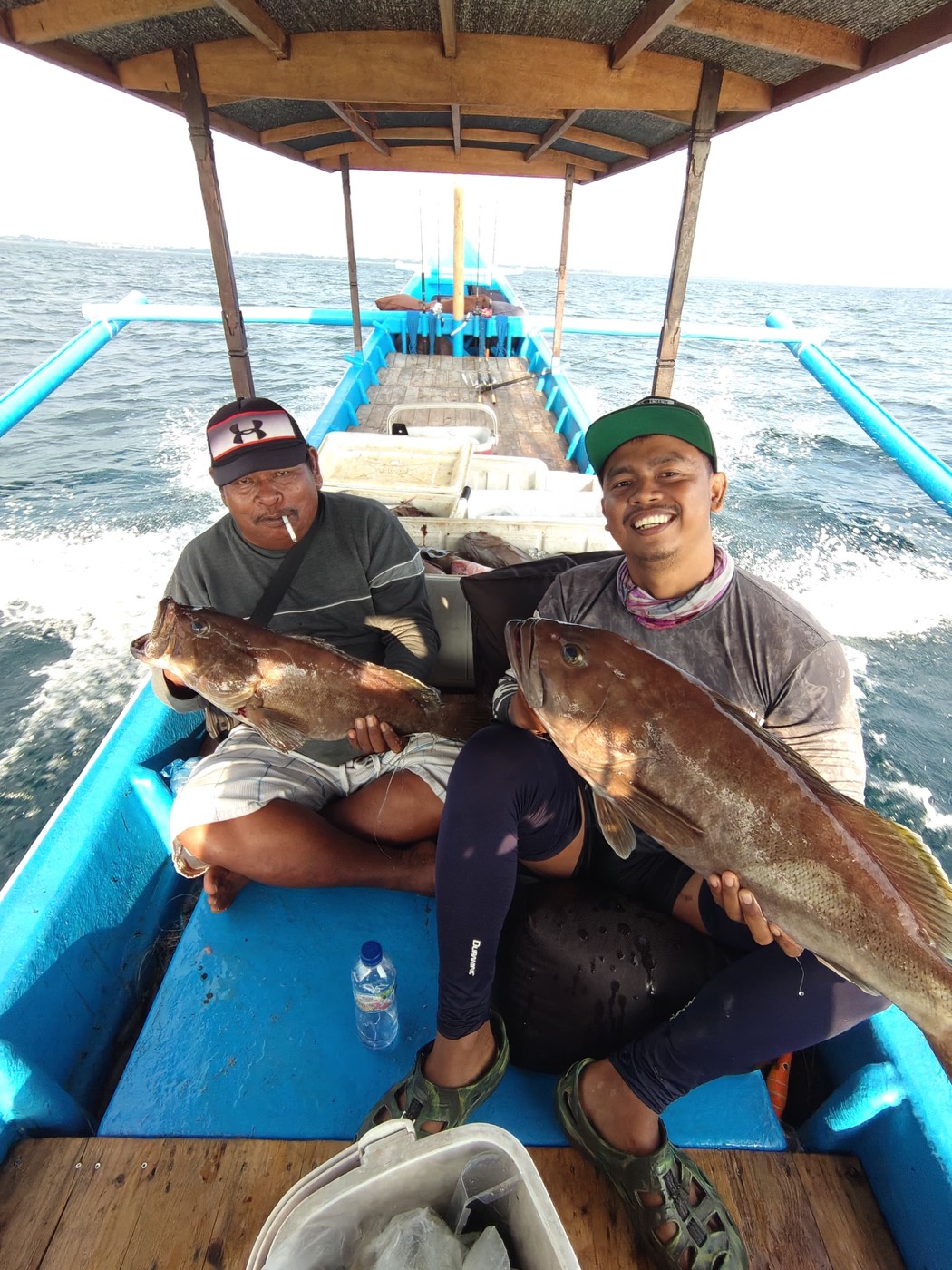 Two groupers landed offshore — Boho Kink Konk fishing charter, Kuta Bali